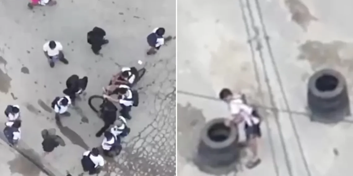 Drone flagra alunos com traficante de fuzil e ajudando a erguer barricadas. Veja vídeo
